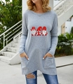 Detail of grey Christmas tunic top featuring festive gnome prints and practical dual pockets - Gray