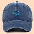 Classic washed navy denim baseball cap with a small embroidered shark mascot design - Adjustable / Blue