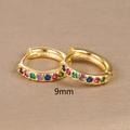 Macro shot of 9mm rainbow earrings featuring multi-color stones in gold finish - 9mm / Gold