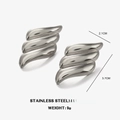 Orecchini ad ala asimmetrici in acciaio inox argento, 3,7 cm di lunghezza e 2,1 cm - Color Acciaio