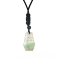Detail shot of a natural green and white fluorite trapezoid pendant with black cord - Fluorite