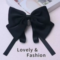 Elegant large black satin bow hair clip with long streamers and silk texture finish - Black