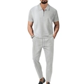 Men's grey waffle knit two-piece set featuring a half-zip polo shirt and matching trousers - Gray