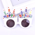Close-up of white birthday cake party glasses with happy birthday text and candle icons - Cake Candle White