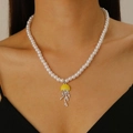 White pearl necklace with yellow and silver jellyfish pendant featuring sparkling crystals - Yellow Jellyfish (11287)