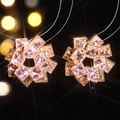 Sparkling pink square zircon flower earrings with premium golden finish on black background - Pink (STE022GL-P)