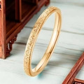 Macro detail of golden titanium steel ring showing frosted texture and polished inner band - US 5 / 2mm Width / Gold