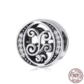 925 sterling silver charm bead with hollow scroll pattern and clear zircon stones - Letter O