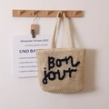 Off-white woven tote bag with black Bon jour embroidery and mesh hollow-out design - Beige and Blue