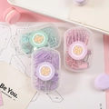 Pink and purple macaron-colored stationery set with paper clips in a clear round box - Thumbtack Set