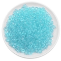Light blue transparent acrylic barrel beads for DIY bracelets in a white ceramic dish - Lake Blue