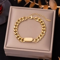 Golden Cuban chain bracelet with rectangular plate and K18 engraving in jewelry box - Gold Bracelet
