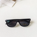 Matte black frame children's sunglasses with UV400 gray lenses and rivet detail - Black