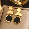 Detail of minimalist geometric 18K gold plated earrings with high polish finish - Gold E-400 (Geometric Black Disc)