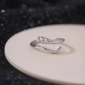 Adjustable S925 sterling silver snake ring with green gemstone eyes on beige stand - Adjustable Open / Platinum Silver/Green Eyes