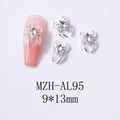 Macro shot of silver spider nail art charm with marquise rhinestone, size 9x13mm detail - Silver Base Clear Stone (AL95)