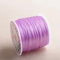 Close-up of durable purple stretchy crystal cord roll for jewelry DIY craft making - Light Purple