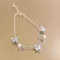 Silver butterfly pearl bracelet with blue enamel charms and adjustable chain links - S699 Pearl - Mint Blue Butterfly Pearl Bracelet