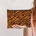 Detail view of the durable leopard print canvas bag with orange tiger pattern and zipper - Tiger Print Style (jiayingpbb0156)