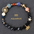 Macro shot of Aquarius beaded bracelet featuring obsidian beads and celestial charms - Aquarius-Faceted Stone