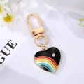 Rainbow heart keychain in gold alloy with colorful enamel stripes and small diamond - Black Heart Rainbow