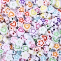 Macro shot of colorful heart star and flower shaped acrylic beads for DIY jewelry making - 4x9mm Heart Flower Star Beads (100pcs)