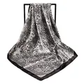 Detailed close-up of the black and white Paisley print on a silk-like square scarf - 90cm*90cm / Black and White