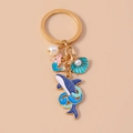 Détail d'un porte-clés thème océan avec pendentifs baleine, sirène et coquillage - Sirène Coquillage & Baleine