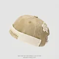 Detalle de gorra retro caqui para niño con parche de estrella y bordados finos - 50cm (Recomendado 1-3 Años) / Caqui