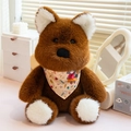Plush brown and white teddy bear doll wearing a light pink floral scarf in cozy home setting - Dog / 50cm