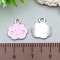 Pink enamel cloud charm with smiling face and silver metal back shown with ruler - 1Pc Pink Smiley Cloud