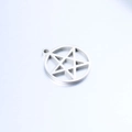 Macro detail of a silver stainless steel pentagram star pendant with a polished finish - Round Star / Steel