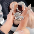 Silver snake wrap ring with green zircon eyes and shimmering crystal details - Silver Scale Texture Double Snake