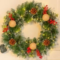 Detail of flocked Christmas wreath with LED lights, pine cones, and red berries - Timer Waterproof Battery Light (SYWT011)