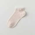 Sweet beige mesh socks with delicate lace frills and a small decorative bow detail - One Size / Pink