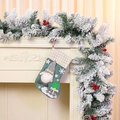 Close-up of burlap Christmas stocking featuring 3D gnome doll and festive snowflake appliques - Sky Blue