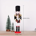 Detail of 30cm wooden nutcracker drummer with red uniform and festive Christmas trees - Fabric Wrapped Drummer