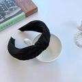 Retro black pleated knotted headband with bow detail on white cup and book setup - Pleated Knot Black (FK-B107 Black)