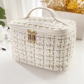 Elegant gold checkered tweed vanity case with a handle and double gold zippers - White