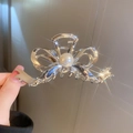 Pinza per capelli a fiocco argento con perla centrale e finitura metallica - Fiocco d'Argento
