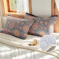Pair of retro floral cotton gauze pillow towels in navy and orange with elastic straps - Navy Ice Dream