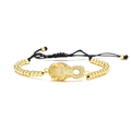 Detail of 18K gold plated leopard head bracelet with sparkling pave crystals - Gold Double Leopard Head Drawstring Style