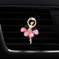 Pink ballerina crystal car air vent clip with gold trim on dark dashboard vent - Pink Dancing Girl