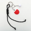 Detail of woven nylon cord with mini red table tennis paddle and ball keychain - Black Rope + Ping Pong