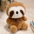 Adorable plush sloth toy with soft brown fur and heart embroidery on the foot - Sitting Sloth