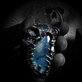 Vintage gothic skull labradorite pendant in antique silver with mysterious blue gemstone - Antique Silver Labradorite Skull Pendant