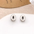 Minimalist silver oval stud earrings with hollow O-shaped design in metallic finish - Silver Letter O
