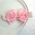Pink lace bow baby headband with elastic cream white strap on a white plate - Dark Pink Bow