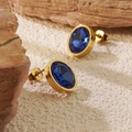 Elegant gold earrings with dark blue oval cut gemstones on natural stone background - Deep Blue Oval Stud Earrings (BD512-blue)