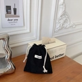 Cute black corduroy drawstring pouch with white cotton ropes for organizing accessories - Black